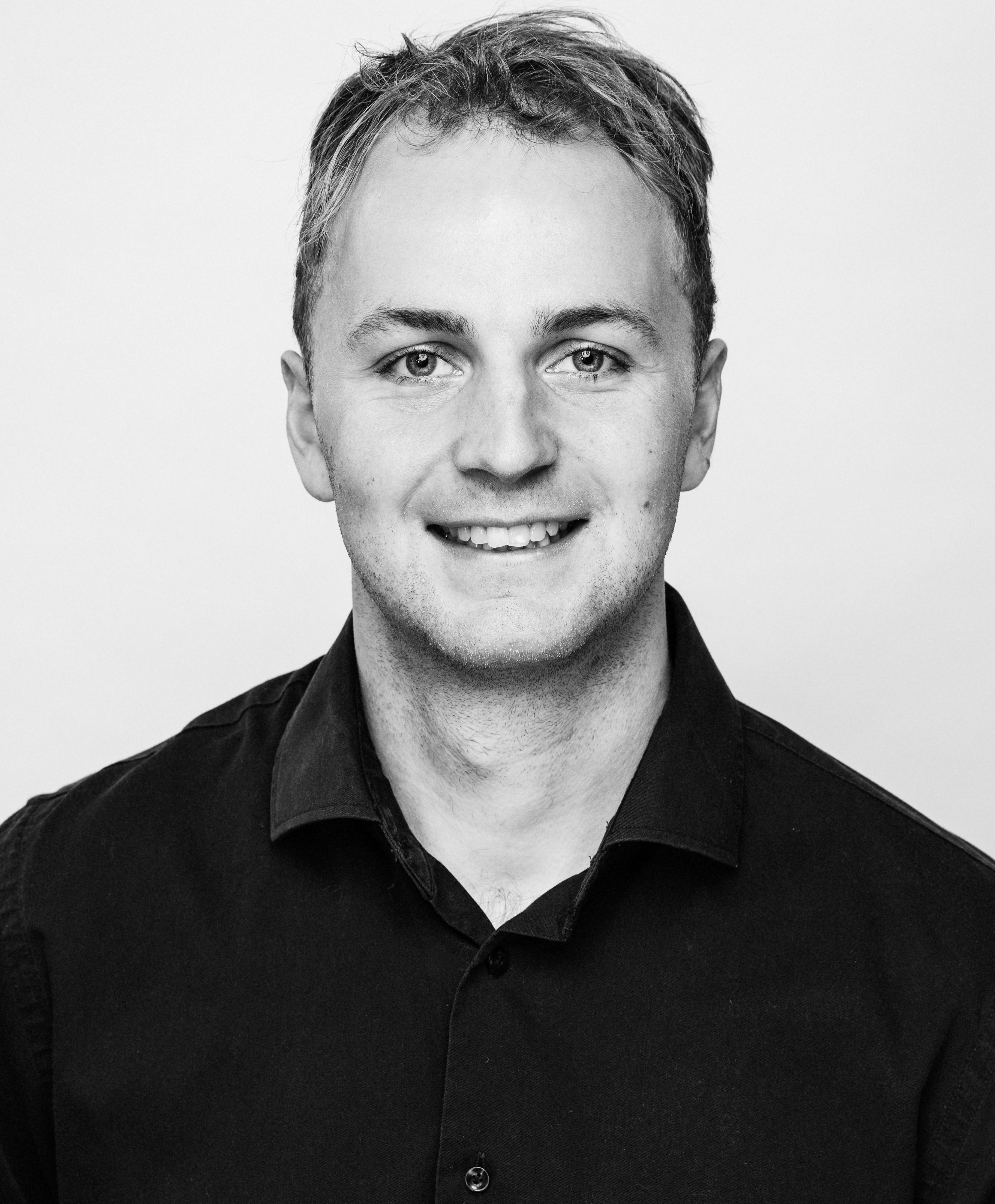 Headshot of Tex Ruskamp, Founder of PeakPersonality.